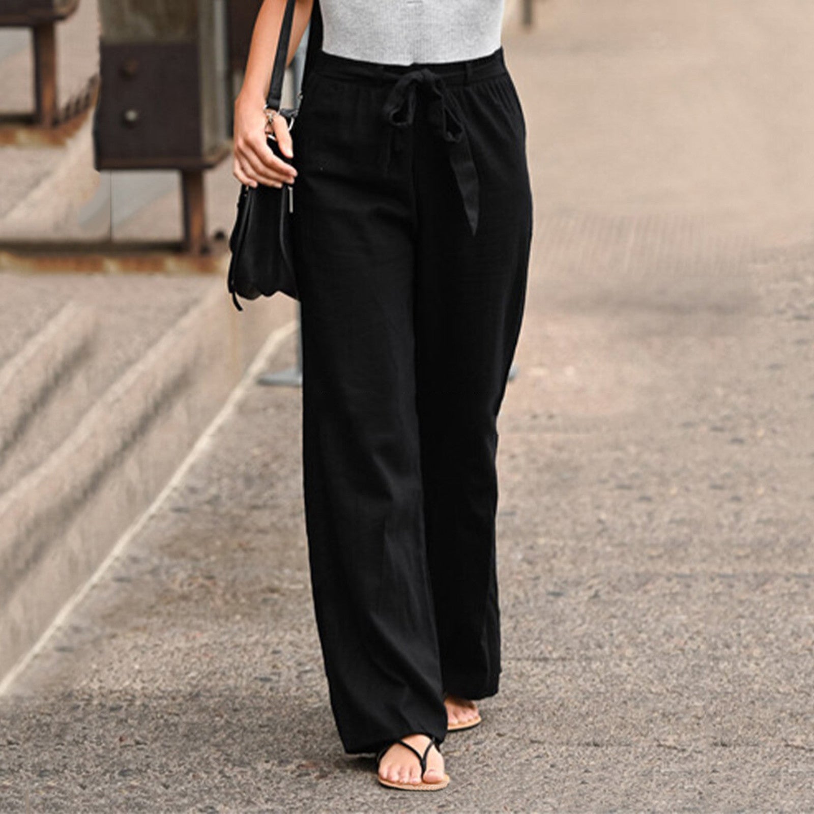 Wide-leg drawstring trousers, side view
