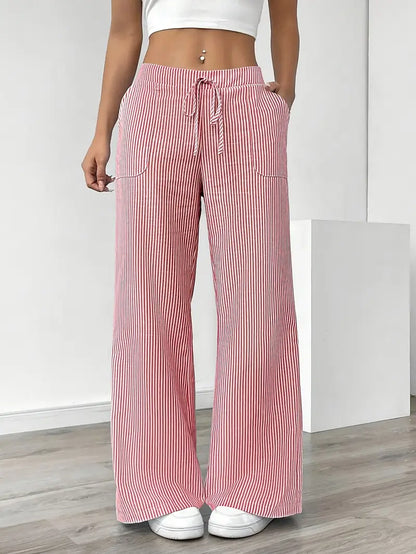 Striped trousers showing high waist