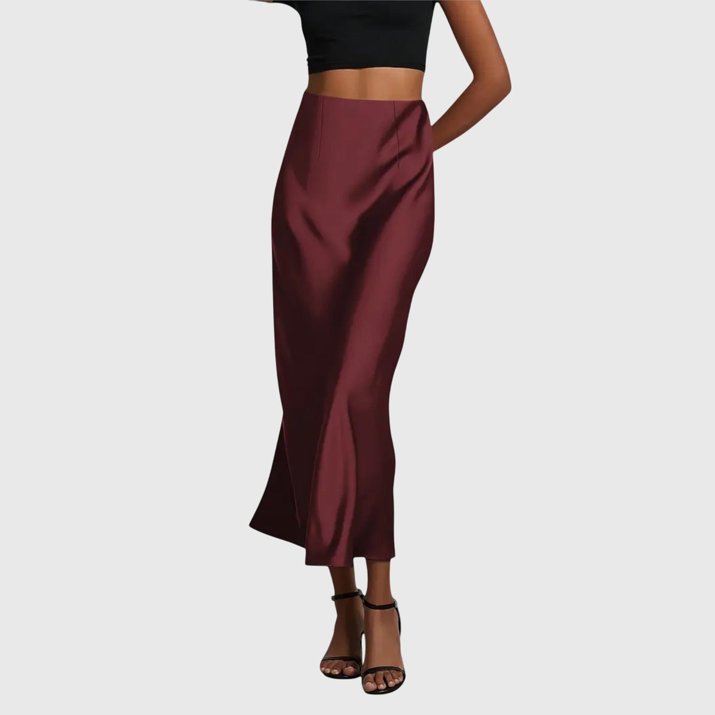 Fitted fishtail skirt styled for evening