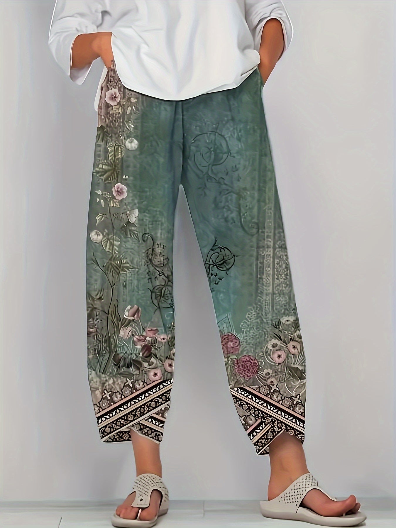 Cropped trousers showing vintage botanical print detail