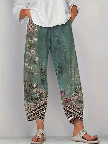 Cropped trousers showing vintage botanical print detail