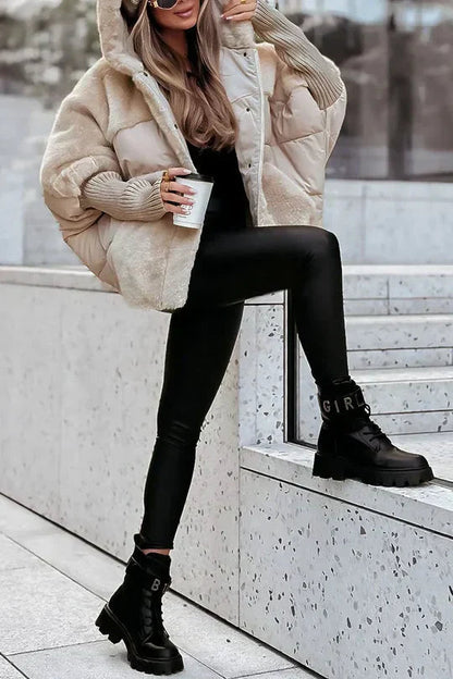 Hooded oversized puffer jacket with faux fur in beige, close-up of the fabric