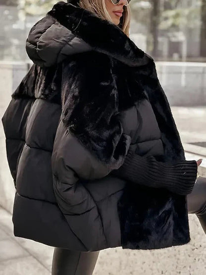 Hooded oversized puffer jacket with faux fur in black, open front view