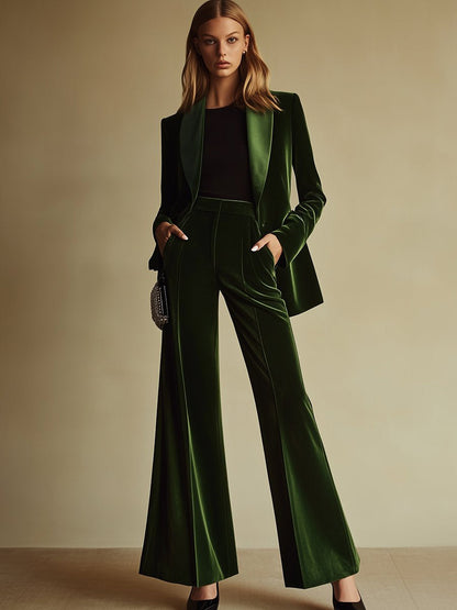 Emerald velvet shawl collar blazer and flare trouser suit, back view