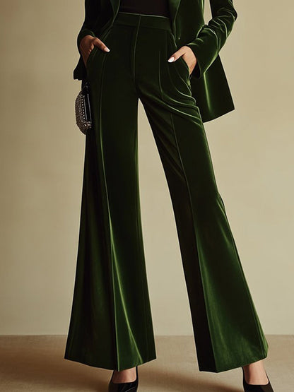 Emerald velvet shawl collar blazer and flare trouser suit, detail of the trousers