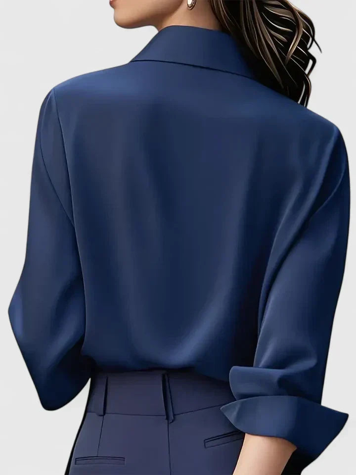 Long sleeve satin collared office blouse, close-up of the fabric
