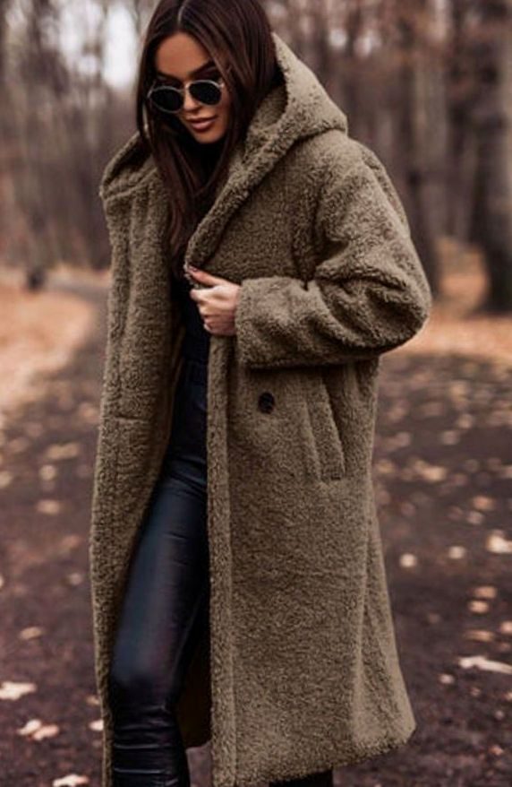Oversized hooded faux fur longline coat, close-up of the collar