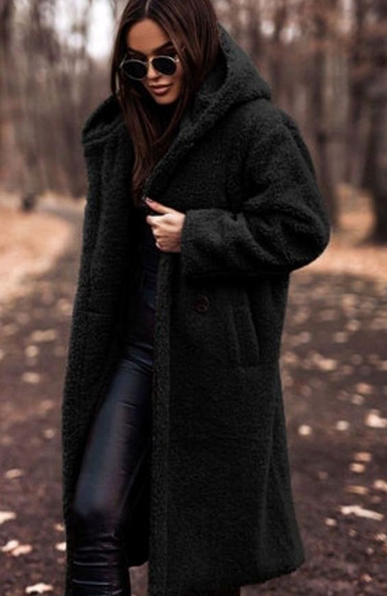Oversized hooded faux fur longline coat, close-up of the fabric