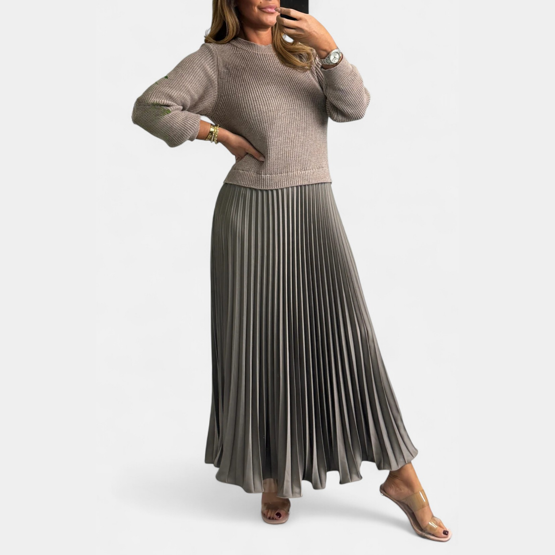Knit sweater maxi dress showing pleated skirt