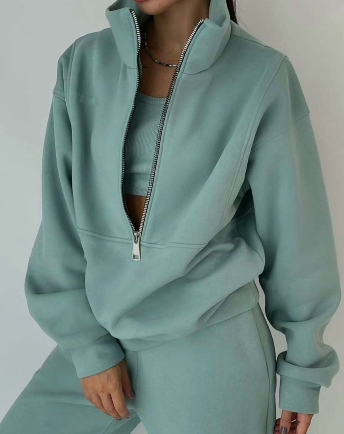 Half-zip pullover and high-waisted jogger set, back view
