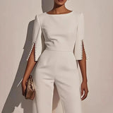 Irene wide-leg jumpsuit with pearl trim, front view