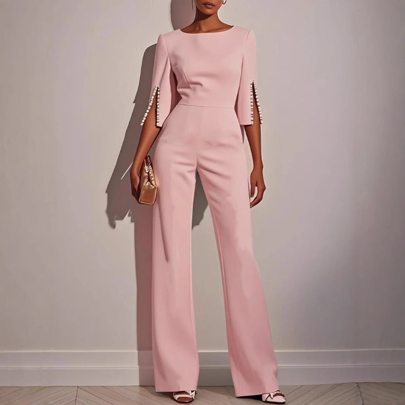 Wide-leg jumpsuit with pearl trim, detail of the waist