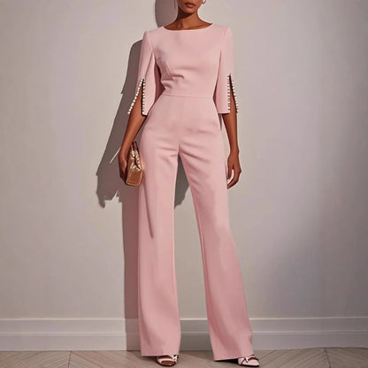 Wide-leg jumpsuit with pearl trim, detail of the waist