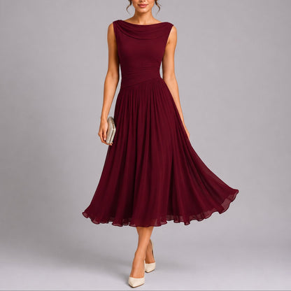 Pleated midi wedding guest dress with draped neck, close-up of the neckline