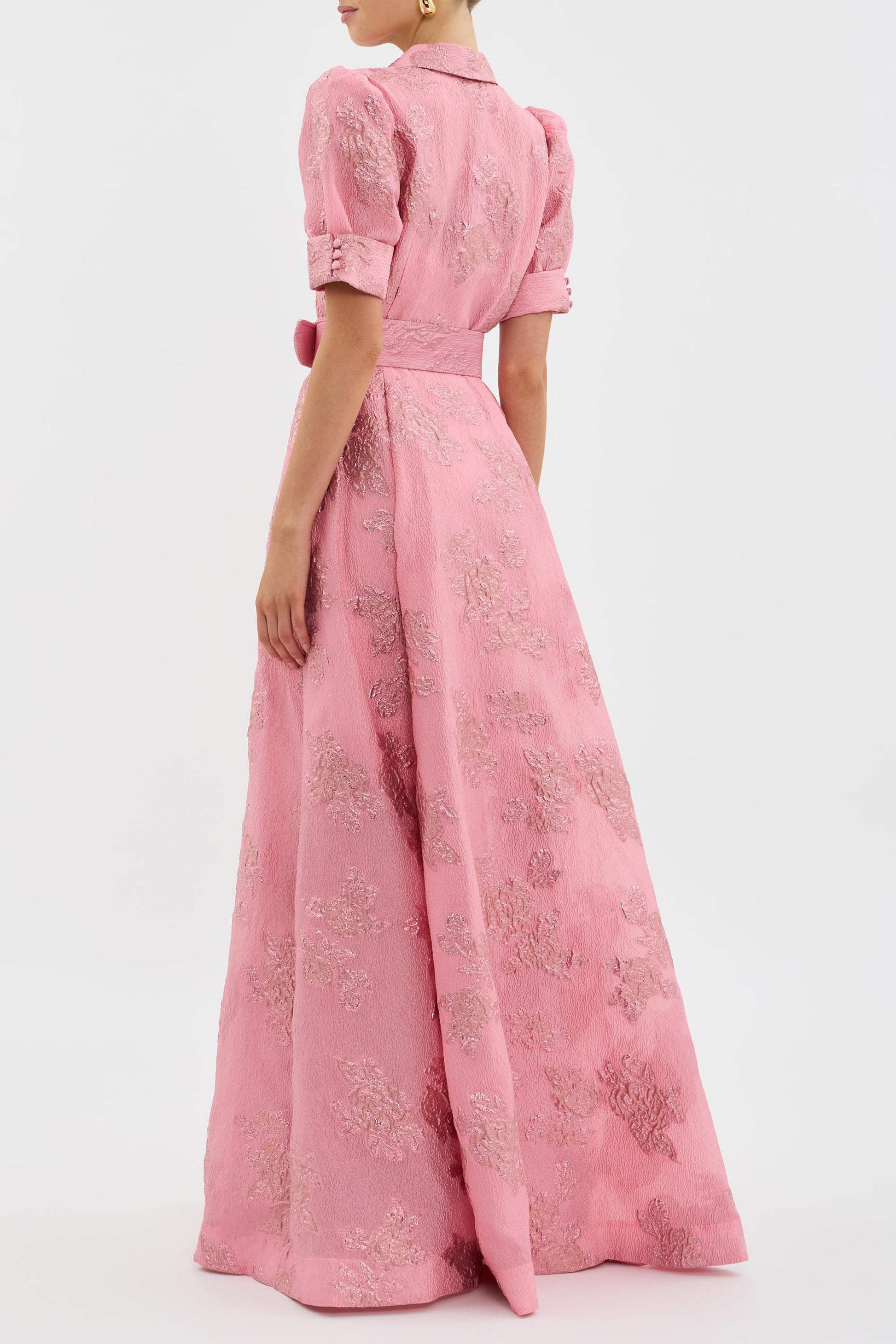 Floral wedding guest dress showing belted waist