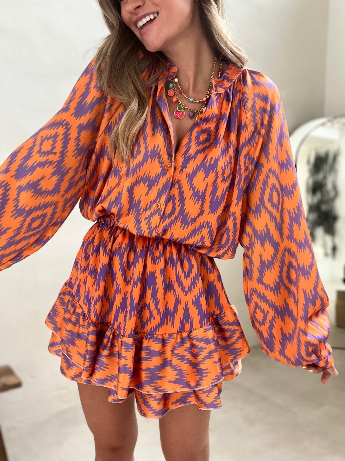 Delphina printed mini dress ruffle hem detail
