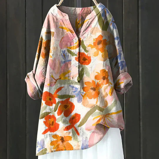 Floral tunic showing V-neckline and print detail