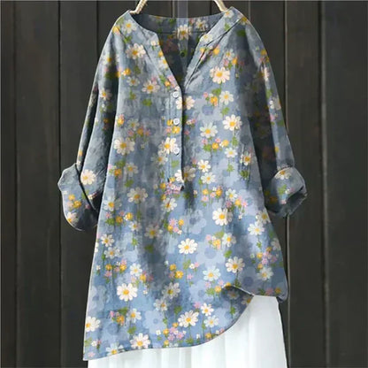 Floral tunic showing rollable sleeve detail