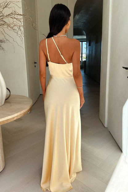 Beige asymmetrical maxi dress side view with slit