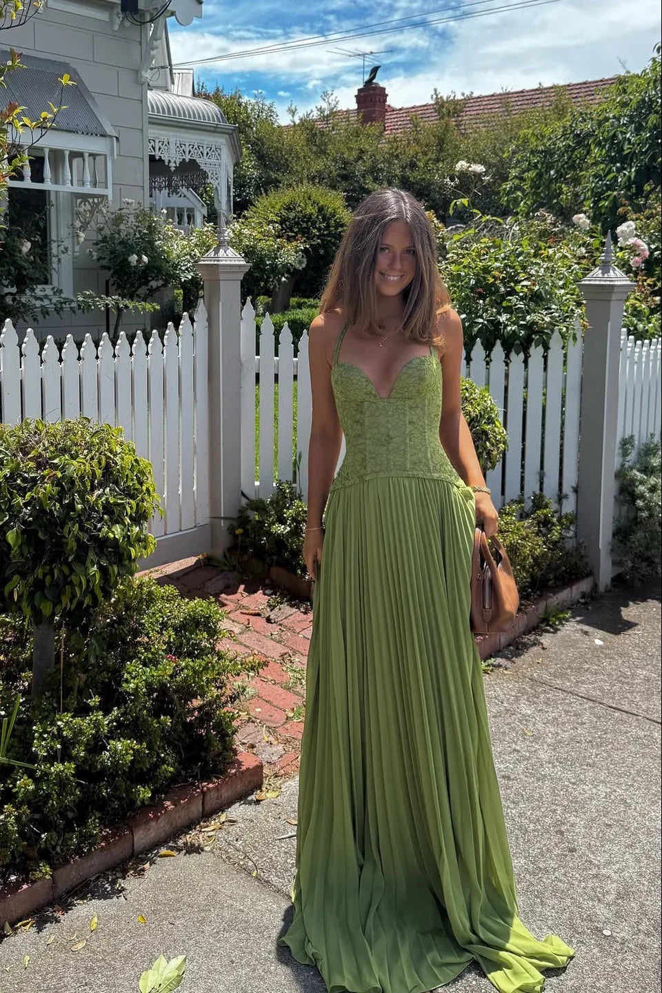 Structured green pleated maxi dress