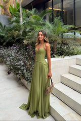 Green pleated maxi dress with structured bodice