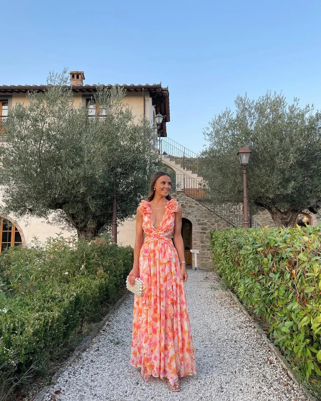 Floral sleeveless wedding guest maxi dress