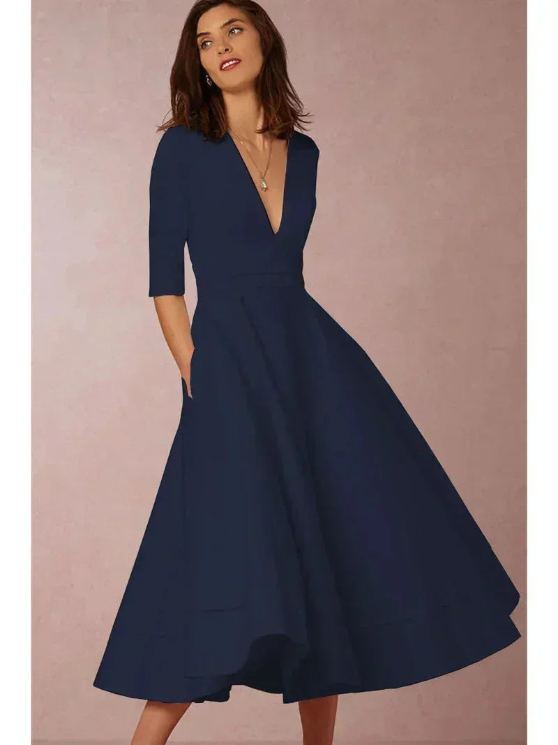 A-line wedding guest midi dress back view