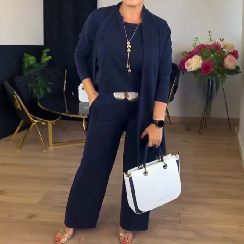 Longline top with straight full-length trousers, side view