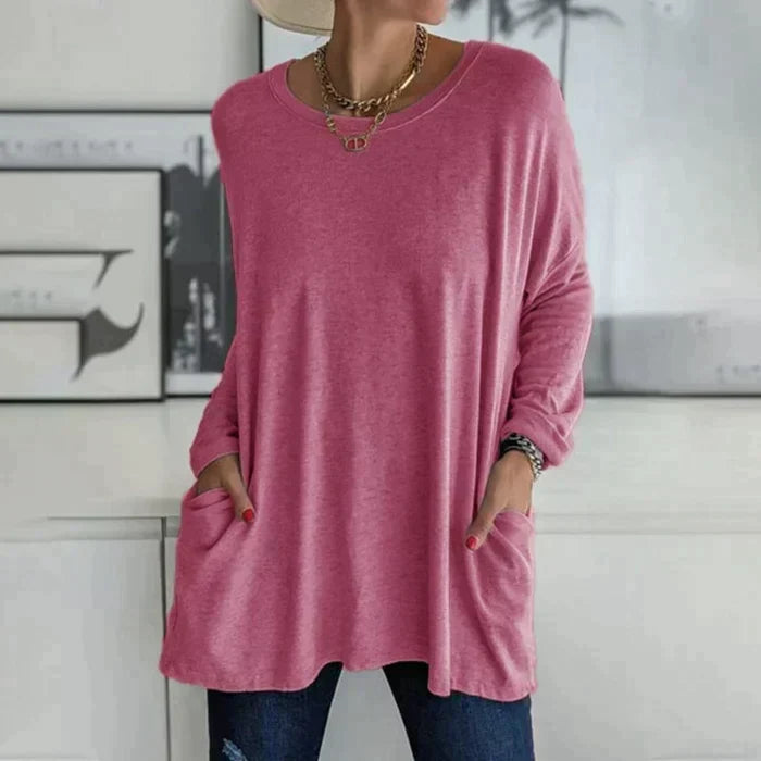 Tunic top showing front patch pockets