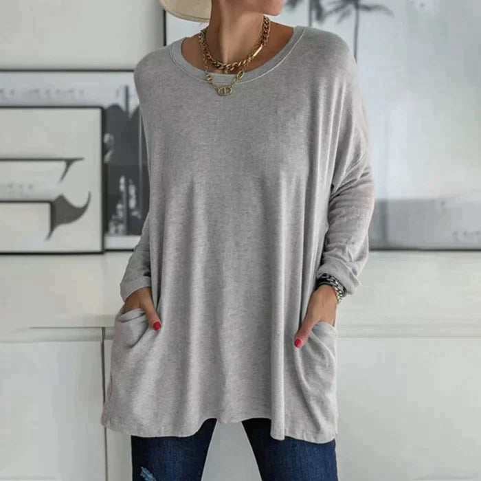Oversized tunic showing round neckline