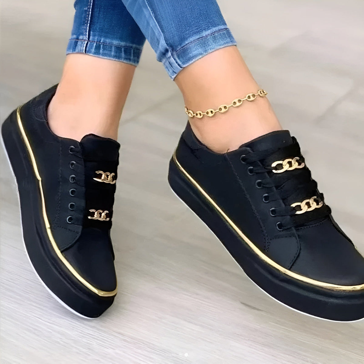 Lace-up platform sneakers with chain details, top view