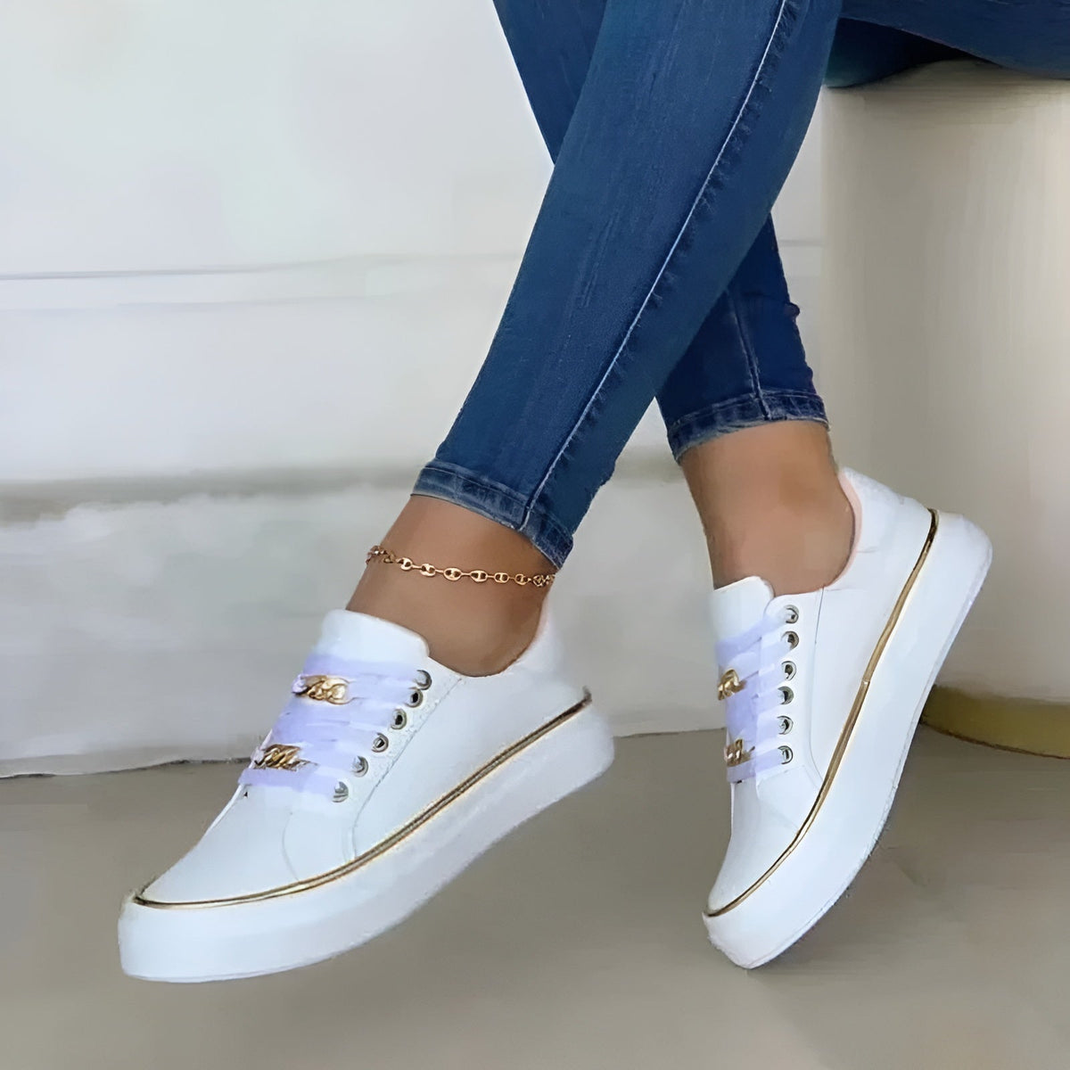 Lace-up platform sneakers with chain details, back view