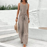 Sleeveless V-neck jumpsuit with tie waist, front view