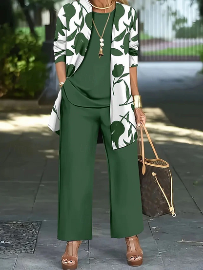 Three-piece floral set showing flowing open layer